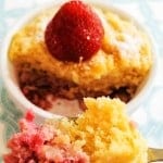 This loEasy Keto Strawberry Mug Cake Recipe.w carb keto strawberry mug cake is super easy to make and yummy but it also looks good! The texture is so fluffy, yet dense enough to feel like an authentic cake. The strawberries also help to keep the cake moist. #ketomugcake #easyrecipe #microwavemugcake #strawberrymugcake